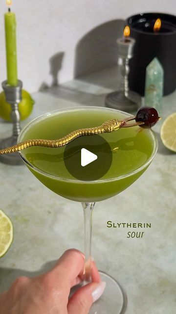 Kelly Pettit | Slytherin Sour 🐍🪄 (aka a tastier midori sour)

1 oz midori
1 oz vodka
.75 oz matcha
1 oz lemon lime juice
.25 oz vanilla syrup
Garnish:... | Instagram Slytherin Cocktail, Snake Cocktail, Harry Potter Cocktails, Midori Sour, Make Matcha, Vanilla Syrup, Halloween Cocktails, Cocktail Picks, 7 Seconds