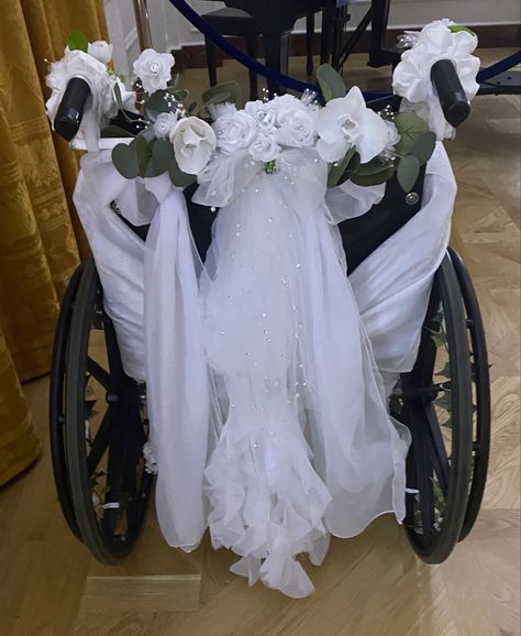 Jenn’s grandma - aka wedding flower girl - rode in this beautiful wheelchair decorated with roses, orchids, greenery and other flowers down the aisle #wheelchairlife #weddingideas #wedding #flowergirl #weddingplanning Wheelchair Wedding Decoration, Decorated Wheelchair Ideas, Decorated Wheelchair, Disabled Wedding, Wedding Wheelchair, Wheelchair Decorations, Flowers Down The Aisle, Wheelchair Wedding, Wheelchair Photography