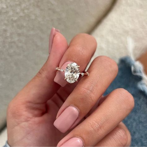 3CT Oval Cut Moissanite Engagement Ring Distance Pave Ring Claw Prongs 14KT Yellow Gold Ring Oval  Simple Engagement Ring Anniversary Gift, Oval cut ring, Moissanite ring, engagement ring, Wedding ring, Anniversary gift, Women Ring ,best moissanite ring, Gifts for Mom, personalized jewelry, Ring For Women. ● 𝗛𝗮𝗻𝗱𝗺𝗮𝗱𝗲 𝗝𝗲𝘄𝗲𝗹𝗿𝘆 The stones in jewelry are 100% hand-crafted it is cut and polished by our experienced craftsman. Moissanite is the diamond's best alternative. ● 𝗠𝗮𝗶𝗻 𝗦𝘁𝗼𝗻𝗲 𝗗𝗲𝘁𝗮𝗶𝗹𝘀 → Shape: Oval Cut Moissanite → Carat Weight: 3 CT (Approx) → Color: D (Colorless) → Clarity: VVS → Measurement: 12x8 mm → Luster: Excellent → Make: High Quality ●  𝗦𝗶𝗱𝗲 𝗦𝘁𝗼𝗻𝗲 𝗗𝗲𝘁𝗮𝗶𝗹𝘀 → Shape: Round Moissanite → Carat Weight:1.30 CT (Approx) → Color: D (Colorless 2.8 Carat Oval Engagement Ring, 2 Carat Oval Engagement Ring With Side Stones, Oval Simple Engagement Ring, Oval Lab Grown Engagement Ring, 2 5 Carat Engagement Ring Oval, Oval Cut Moissanite Engagement Ring, Simple Engagement, Engagement Rings Sale, Rings Etsy