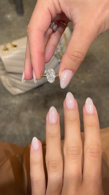 EAST WEST GEM CO. // on Instagram: "This super elongated 6.15 carat oval in our vintage white moissanite looks so dreamy and is securely set in our Harper solitaire setting with the following combination of upgrades that enhance its structural stability 🔒  💎Double claw prongs: $200 💎Donut: $400 💎1.8mm band thickness (from 1.5mm): $150  -————————— #EASTWESTHARPER - 6.15 carat center (1.66 ratio)  - 13.25x8mm crushed ice hybrid oval, vintage white moissanite set in a 14k yellow gold setting  - “More metal” 1.8mm solitaire band, double claw prongs and a donut - $3,300 (as shown) 💵 Or as low as $114.98 a month with Bread Pay* 🤚🏻 Shown on a size 4.5 finger" Oval Solitaire Engagement Ring 2ct, East West Oval Engagement Ring, East West Gem Co, Pretty Engagement Rings, Solitaire Bands, Oval Solitaire Engagement Ring, Elongated Cushion Cut, 5 Fingers, Solitaire Setting