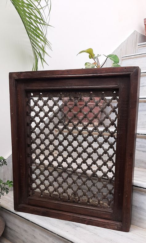 "This is an antique style old wooden frame iron jail work is an exceptional and rare piece of art, more then 50 years old. It will be a unique addition to your home decor.Best way to gift your loved ones on any occasion/festivals. Request you to go thru the pics. thoroughly to avoid any disappointment after purchase. Being old piece there is slight damage,crack lines, uneven finish and discolors etc.. Description Frame Size: - 21.5\"x 2.5\"x 25\" (l x w x h) approx. Size of Jali :- 16\" x 19.2\" ( l x h ) approx. Weight: 12874 grams Condition: - good old condition, more then 50 years old (due to hand finishing process, there may be slight variations in finish/color & size.) Being complete handicraft the imperfection is always there. Color: - brown Material: - wood & metal You will receive Moroccan Headboard, Jali Wall, Jali Work, Wall Decor Indian, Indian Bedroom, Window Ideas, Wooden Windows, Wooden Wall Hangings, Brown Walls