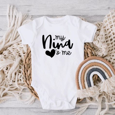 Robtina & Co. | Baby Apparel on Instagram: “For all of the proud Nina’s & Nino’s ♡ . . Shop now. Link in bio! . . . . . . #CustomOnesie #CustomOnesies #ProudNina #ProudNino…” Padrinos Proposal, Godparent Proposal, Godchild Gift, Cute Onesies, Custom Onesies, God Parents, Baptism Gifts, Iron On Vinyl, Toddler Tees