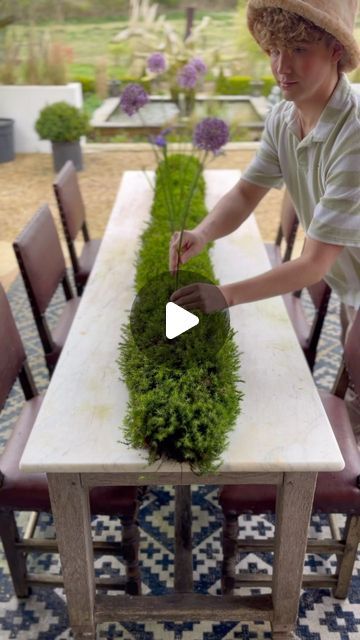 Jack kinsey [ Interior Design Masters ] on Instagram: "ad I’ve decided to try out Moss instead of Oasis for a change to take on the job of supporting this table arrangement 😍 what do you think?

 Seasonal flowers are giving VOGUE.

I LOVE creating tablescapes and floral arrangements using flowers that are in season as; A it’s budget-friendly, and B; it’s environmentally friendly!
These budget blooms included Chrysanthemums at £3 a stem, 5 Alliums for £7, 5 Hyacinths for £7 and a bunch of Statice for £6!

 They were from my local market in Norwich, @carysflowersltd a family-run business which I love to support 🌸 

 

#budgetblooms @howflowersdothat #cutflowers #tablescape #tablescapes #flowers #flower #arrangement #homedecor #ukhome" Oasis Flower Arrangements, Chrysanthemum Flower Arrangement, Interior Design Masters, Table Flower Arrangements, Table Arrangement, Chrysanthemum Flower, Local Market, Uk Homes, Seasonal Flowers