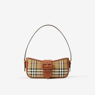 Sling BagPrice £1,190 £1,190 Monthly payments available COLOUR:Archive Beige/Briar Brown An Italian-made bag in Burberry Check, the style is defined by a buckled strap inspired by our signature trench. 26 x 6 x 12cm/10.2 x 2.4 x 4.7in Min strap drop: 25cm/9.8in Max strap drop: 30cm/11.8in Burberry Shoulder Bag, Monthly Payments, British Design, Burberry Bag, Signature Style, Sling Bag, Leather Shoulder Bag, Luxury Bags, Leather Bag