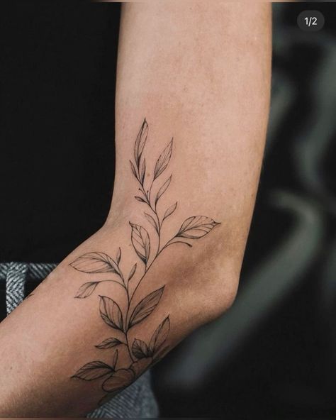 Words Around Elbow Tattoo, Flower Tattoo Around Elbow, Forearm Elbow Tattoo Women, Vine Around Elbow Tattoo, Tattoo Around The Elbow, Upper Arm Sticker Tattoos, Tattoos Around The Elbow, Leaf Elbow Tattoo, Front Of Elbow Tattoo