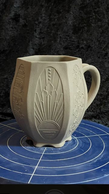 Christina Orthwein on Instagram: "My latest Art Deco Weather Mug. This is many hours of work condensed into one speedy minute. I’ve been tinkering with this design for a while. Feels good to see it together. #mugshotmonday #pottery #clay #ceramic #ceramics #handmade #mug #artdeco #art #design #weather #ChristyNockels" Ceramic Mug Handles Design, Art Deco Mug, Clay Cup Ideas Mugs, Pottery Stencils Ideas, Surface Design Ceramics, Ceramic Mug Inspiration, Art Deco Ceramics, Ceramic Handles Ideas, Mug Handle Ideas