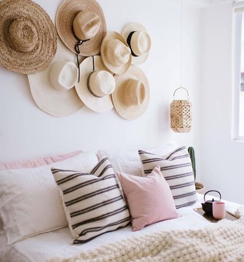 You gotta love a good hat. Toss your hair back, pop it on your head, and you’re out the door. There’s only one challenge when it comes to your carefully curated collection — where are you going to store them all? Here are eight creative ways to store all of your beloved chapeaux around your abode. Bed With Drawers Underneath, Diy Hat Rack, Creative Headboard, Textured Blankets, Asian Homes, Hat Organization, Asian Home Decor, Sleep Routine, Bohemian Living