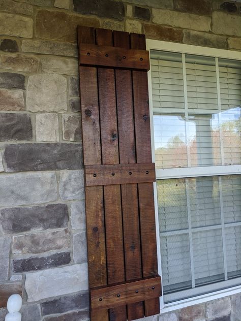 Walnut Shutters Exterior, Large Window Shutters Exterior, Rustic Wood Shutters, Barnwood Shutters Exterior, Rustic Farmhouse Shutters Exterior, Wooden Window Shutters Exterior, Homemade Shutters Outdoor, Early American Stain On Cedar, Wood Shutters On Brick House