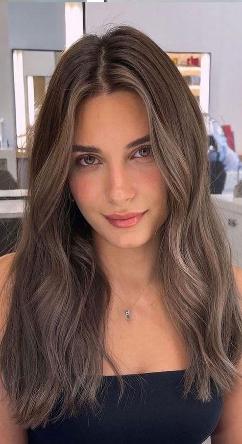 16. Ash Brown with Waves If you’re complaining about how hot the weather is right now, you probably can’t wait for the cooler weather. Who’s... Fall 2022 Hair Trends, Fall 2022 Hair, Mushroom Bronde, Expression Braiding Hair, Highlights 2022, 2022 Hair Trends, Hairstyles Balayage, Balayage Brown, Haircuts Blonde