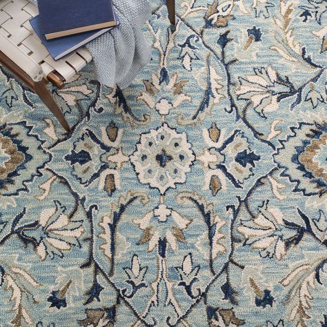 The floral rugs of the Blossom Collection are bold, colorful updates of classic hooked rugs. Made using large hand woven loops, the texture of Blossom rugs inspires a fresh approach to country casual interiors. Woven of 100% wool, Blossom area rugs bring traditional English chintz and block print motifs into today's cultured home decor. Safavieh 2 x 12 Wool Blue/Ivory Indoor Floral/Botanical Runner Rug | BLM457M-212 Floral Rugs, Blue Wool Rugs, Country Casual, Hooked Rugs, Traditional English, Rug Blue, Modern Floral, Blue Ivory, Accent Rugs