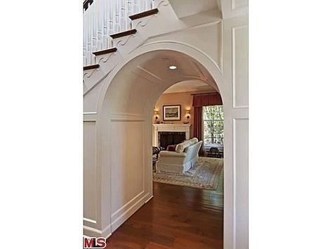 Door Under Stairs, Homes For Sale Near Me, Cottage Exteriors, Arch Doorway, Room Styles, Understairs Storage, Pacific Palisades, Stair Storage, Under Stairs