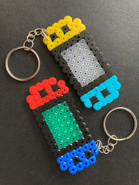 A mini switch for those who love a good switch game.  Perfect for the switch fan or as a gag gift for the person who wants a switch but can't get one.  Can be attched to anything you desire and the joy cons can be switched with any colour combinations you like. Switch Perler Bead, Mini Perler Bead Patterns Easy, Perler Bead Keychain Ideas, Mini Hama Beads, Perler Bead Designs, Easy Perler Bead Patterns, Melty Bead Patterns, Pearl Beads Pattern, Easy Perler Beads Ideas