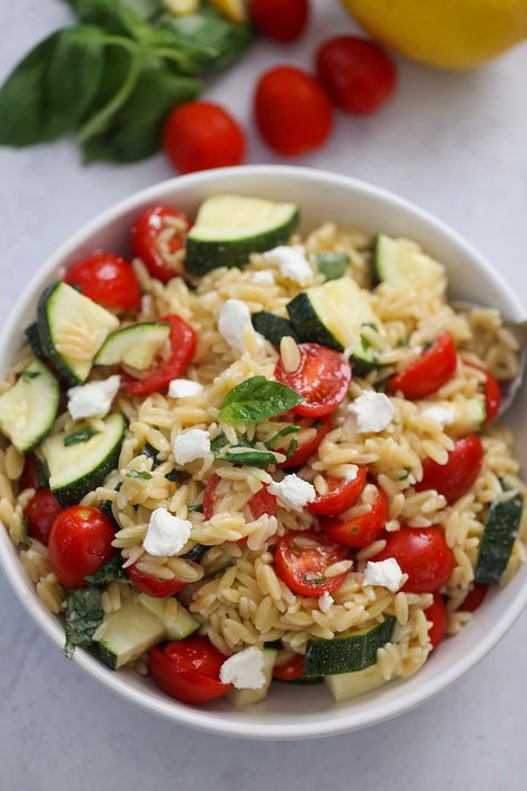 Lemon Orzo Pasta Salad (With Goat Cheese) - Cooked by Julie Pasta Salad Goat Cheese, Goat Cheese Pasta Salad, Lemon Orzo Pasta Salad, Zucchini Orzo, Lemon Orzo Pasta, Basil Goat Cheese, Orzo Pasta Salad Recipe, Hawaiian Macaroni Salad, Seafood Salad Pasta