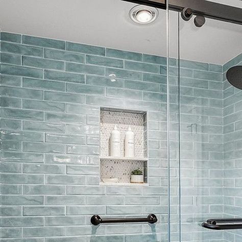 Bathrooms of Instagram on Instagram: "Coastal blues kept a little more modern by these matte black accents 🩵🖤  Build @clancy_construction  Wall tile by @bedrosianstile  Floor tile by @msisurfaces  Fixtures by @brizofaucet  . #bathroom #bathroomdesign #bathroominspiration #bathroomsofinstagram #bathroomsofinsta #capecod #falmouth #newengland #customhomes #custombuilder #architecture #remodel #builders #construction #interiordesign #tile #tiledesign #showerdesign #showers" Blue Tile Bathroom Ideas, Coastal Blues, Fried Apples, Blue Tile, Girls Bathroom, Coastal Blue, Falmouth, Blue Tiles, Black Bathroom