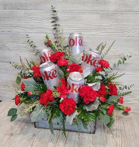 Diet Coke was the centerpiece of this fresh cut arrangement made with Ted narrations, red mini carns, dusty miller & eucalyptus Diet Coke Party Theme, Diet Coke Bouquet, Diet Coke Party, Coke Bottle Crafts, Cola Cake, Bottle Centerpieces, Red Carnation, Coke Cola, Dusty Miller