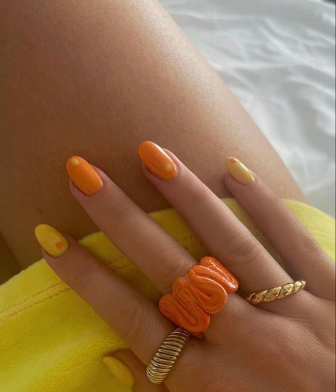 Nails Hands Different Colors, Basic Orange Nails, Orange Nails Different Shades, Orange Funky Nails, Orange Nails Fruit, Yellow Orange Nails, Orange Nail Polish Aesthetic, Yellow And Orange Nails, Homemade Nails