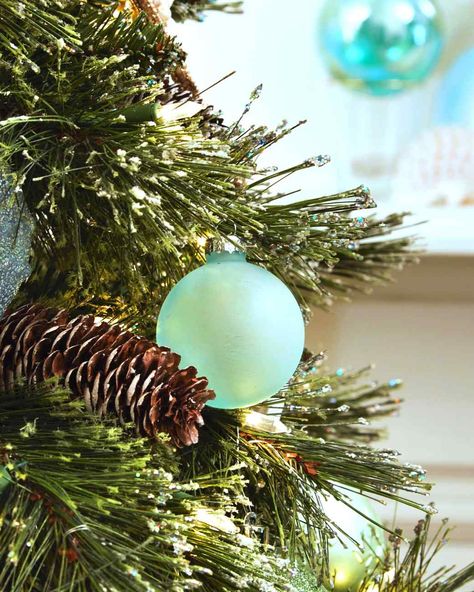 Sea Glass Holiday Tree Ornaments | Martha Stewart Living — We used specialty sea glass paint in order to give glass ornaments a frosted aqua-colored effect.\ Sea Glass Paint, Sea Glass Ornaments, Glass Paint, Glass Ball Ornaments, Sea Glass Crafts, Coastal Christmas, Unique Diy Gifts, Seashell Crafts, Handmade Christmas Ornaments