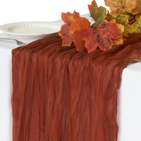 PRICES MAY VARY. Cheesecloth 10FT Fall Table Runner: Our terracotta cheesecloth table runner is measure 35 wide x 120in(10ft) long, can be perfectly and gracefully placed on the table and hung on the floor, which will add a romantic atmosphere to your occasions. Rustic Style: Our fall table runner is made of polyester gauze with wrinkled gauze fabric, the wrinkles in it will and made table beautiful. These dazzling linen table runner are perfect for creating an elegant, upscale tablescape. Reusa Terracotta Table Runner, Simple Thanksgiving Table Decor, Terracotta Table, Baby Shower Table Centerpieces, Friendsgiving Decorations, Cheesecloth Table Runner, Fall Table Runner, Romantic Candle Light Dinner, Thanksgiving Table Runner