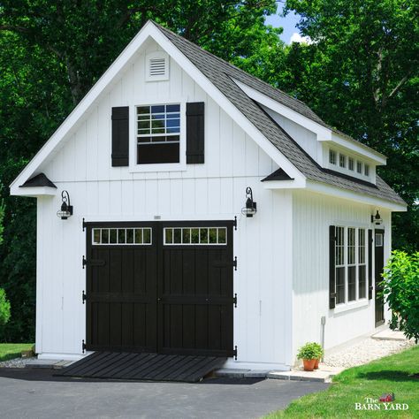 The modern look of white siding with black doors is here to stay! This 14' x 24' Grand Victorian Cape sports the modern look, and does so with style, featuring an 8' double door with transoms and a 5-window transom dormer. Sheds With Garage Door, White Shed Black Door, White Shed Black Trim, Shed With Carport, Backyard Suite, Extra Garage, Garage Building Plans, Window Transom, Barn Style Garage