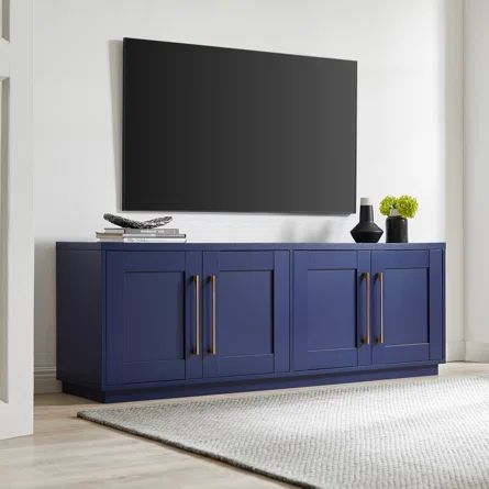 Lark Manor Aizen TV Stand for TVs up to 78" | Wayfair Organizing Games, Frame Paneling, Blue Tv Stand, Slim Cabinet, Modern Tv Unit Designs, Modern Tv Units, Cabinet Door Handles, Tv Unit Design, Clearing Clutter