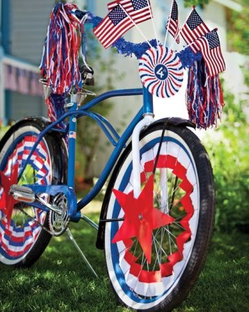 A good ol' fashioned bike rodeo, at least that's what my dad used to call it. Let's get the neighborhood kids together, decorate the bikes 'n' trikes and parade through the neighborhood. What a fun tradition to add to our July 4th celebration!  -tkz 4th Of July Parade Bike Decorations, Red White And Blue Decorations, Bike Parade, Martha Stewart Holiday, Bike Decorations, Blue Decorations, Parade Ideas, 4th Of July Parade, Fourth Of July Decorations