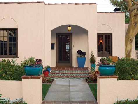 Boost your Mediterranean-style home's curb appeal with these simple landscaping and home maintenance tips from HGTV. Spanish Style Homes Exterior Curb Appeal, Spanish Style Homes Interior Living Rooms, Small Mediterranean Homes, Spanish Style Home Exterior, Spanish Style Home Interior, Mediterranean Homes Exterior, Mediterranean Exterior, Mediterranean Mansion, Spanish Bungalow