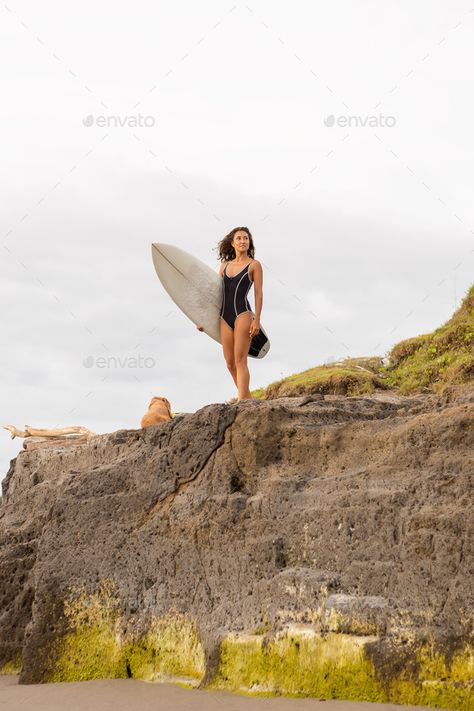 Surfing time for sporty lady. by nikkolia. Surf girl with long hair go to surfing. Smiling surfer woman holding surfboard on a rock and ready to have fun in oce... #AD #girl, #Surf, #hair, #long Surfer Woman, Surf Hair, Surf Girl, Female Shorts, Water Skiing, Long Hair Girl, Hair Long, Wild Flower, A Rock