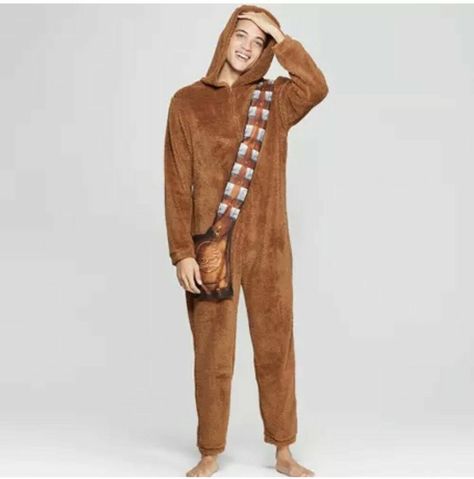 STAR WARS Mens Chewbacca Onesie 100% Polyester Zipper closure Mens Star Wars Chewbacca Onesie WURRRWUHHH! Release your inner Wookiee in this awesome Chewbacca onesie Mimicking the warm-hearted Wookiee's iconic look, this onesie crafted from super soft fabric features an applique of Chewie's signature bandolier and side satchel as a large pocket With lined hood and zipper closure, this all-in-one pajama is perfect for any Star Wars superfan Affiliate Shark Costume Kids, Hooded Pajama, Chewbacca Costume, Star Wars Onesie, Pajama Costume, Suit Costume, Union Suit, One Piece Clothing, Star Wars Men