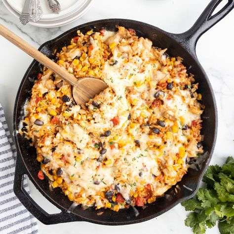 A skillet pan of taco rice with cheese. Taco Chicken And Rice, Chicken Taco Rice, Taco Rice Recipe, Seasoning Rice, Easy Chicken Taco, Chicken Black Beans, Top Dinner Recipes, Taco Chicken, Mexican Chicken And Rice