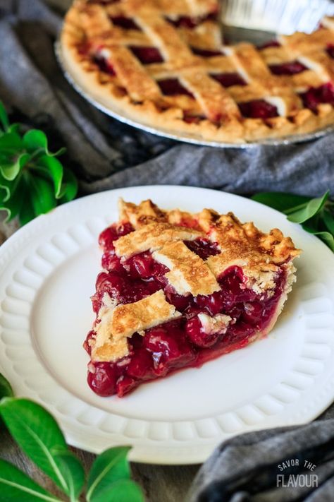 Sour Cherry Pie from Scratch: craving a slice of sour cherry pie this summer? It’s easy to make this old fashioned dessert from scratch with canned cherries—just like Mom does. The flaky crust and sweet, juicy pie filling make this cherry pie a simple but delicious treat. | www.savortheflavour.com #cherrypie #sourcherries Cherry Pie Frozen Cherries, Berry Deserts, Best Cherry Pie, Easy Cherry Pie, Sour Cherry Recipes, Sour Cherry Pie, Salads Healthy, Pie From Scratch, Cherry Pie Recipe