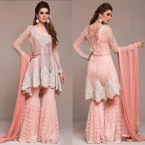 Sharara style is the most #trending outfit this wedding season. The sharara suit is a three-piece outfit which consists of a kurta, #flaredpants and a dupatta. This royal #outfit with a modern twist can take your style statement up a notch. The elegant #sharara is a must-have in every Indian woman’s wardrobe! #traditional outfit #sharara #pastelsuits #indianwedding #indianbride #wedding #bridaloutfit #latestsuits #trendingsuits #trendingsharara #latestsharara #weddingideas #weddinginspiration Pakistani Engagement Dresses, Pakistani Sharara, Gharara Designs, Orang India, Zainab Chottani, Short Frocks, Sharara Designs, Pakistani Wedding Outfits, Gaun Fashion