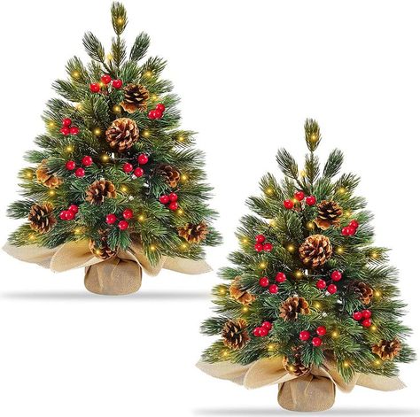 2 pack Very Thick Tabletop Christmas Tree, each contains Realistic Feel 45 pine branches, 8 pine cones, 24 red berries. Overall 20 inch height with 4.3*2 inches wooden base, the tabletop Xmas tree can be standing stably. 8 Modes setting: Combination, In waves, Sequential, Slow Glow, Chasing, Slow fade, Flash, Steady on. Prelit Christmas Tree contains 50 LED warm white Lights that is operated by 3AA batteries (not included), convenient to decorate at any place. Small Christmas Trees Decorated, Pre Lit Christmas Tree, Christmas Tabletop, Tabletop Christmas Tree, Little Christmas Trees, Flocked Christmas Trees, Small Christmas Trees, Christmas Tree Decor, Indoor Christmas Decorations