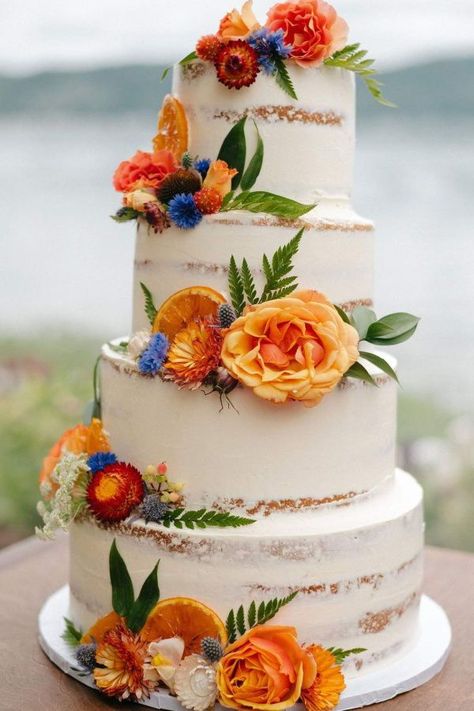 Take a look at this gorgeous rustic wedding! Love the naked tiered cake decorated with beautiful fresh flowers! See more party ideas and share yours at CatchMyParty.com Blue And Orange Cake Birthday, Blue And Orange Cake Ideas, Wedding Cake With Oranges, Cake With Orange Flowers, Rustic Wedding Cake Orange Flowers, Orange Wedding Cake, Rustic Party, Wedding Cakes Blue, Rustic Wedding Cake