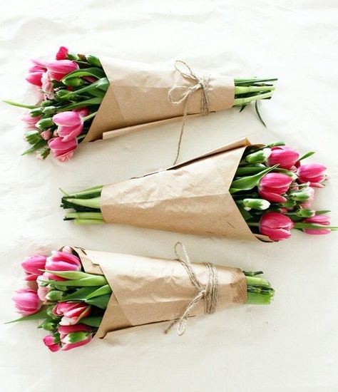 Bouquets for women's day!  Flowers wrapped in paper.