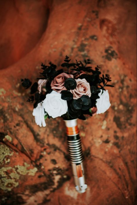 #wedding #weddingideas #starwars #lukeskywalker #bouquet #weddingbouquet #lightsaber @cactusandlace Sith Wedding, Starwars Wedding Dresses, Indiana Jones Wedding, Starwars Wedding Theme, Star Wars Flowers Arrangements, Star Wars Flower Bouquet, Star Wars Wedding Decor, Star Wars Wedding Bouquet, Star Wars Bouquet