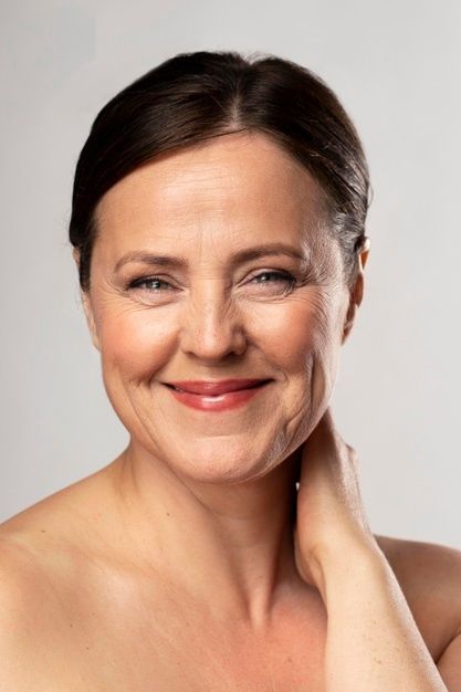 Front view of smiley mature woman posing... | Free Photo #Freepik #freephoto #woman #beauty #health #face Vista Frontal, Brown Spots Removal, Woman Posing, Young Skin, Dark Under Eye, Dark Circles Under Eyes, Face Wrinkles, Remove Dark Circles, Saggy Skin