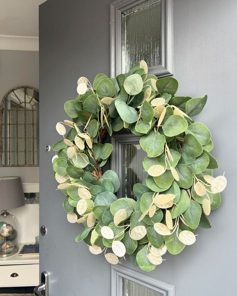 New wreath - A simple yet elegant all-year-round wreath with faux eucalyptus and honesty. Dress up your front door for the season with a touch of class, and boost your curb appeal. This eye-catching handmade wreath will make a great first impression on guests and passers by. - now listed and ready to order - to shop visit my Etsy shop - link in bio #christmasdecor #doordecor #handmadewreaths #wreathmaker #christmaswreath Faux Eucalyptus, Wreath Maker, Year Round Wreath, Handmade Wreaths, Touch Of Class, First Impression, Curb Appeal, Door Decorations, Front Door