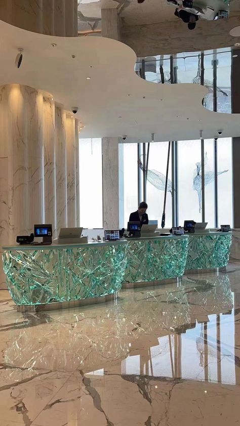 This is art smart glass design for commercial building reception desk. #hotel #commercialbuilding #smartdesk #newidea #newdesign #newidea #innovation#decor Glass Reception Desk, Glass Reception, Office Reception Design, Smart Desk, Reception Desk Design, Smart Glass, Office Reception, Reception Design, Commercial Building