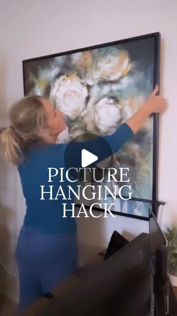 Hanging 2 Pictures On The Wall, Hang Large Pictures, Frame Hanging Hacks, How To Hang Three Pictures In A Row, How To Easily Hang Pictures On Wall, Hack For Hanging Pictures, How To Hang A Canvas On The Wall, How To Hang Large Pictures On The Wall, Easy Picture Hanging Hacks