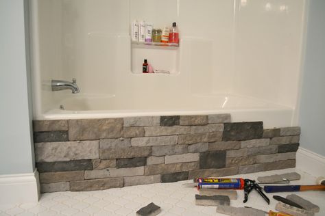 Bye Bye Builder Grade Bathtub | Cheap Bathroom Flooring, Bathtub Makeover, Bathroom Rehab, Recycled Granite, Cheap Bathtubs, Coopers Hawk, Bathtub Cover, Tub Remodel, Bathtub Surround