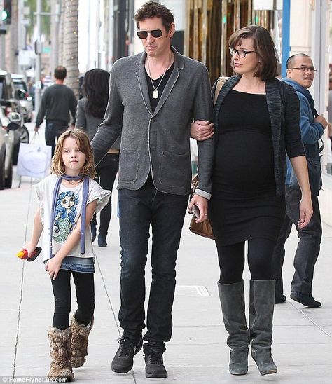 Happy family: Milla Jovovich enjoyed an outing in Beverly Hills on Saturday with husband Paul W.S. Anderson and their seven-year-old daughter Ever Ever Gabo Anderson, Ever Anderson, Pregnant Actress, Mila Jovovich, Estelle Lefébure, Romeo Beckham, Pink Flip Flops, Chloe Bennet, Laetitia Casta