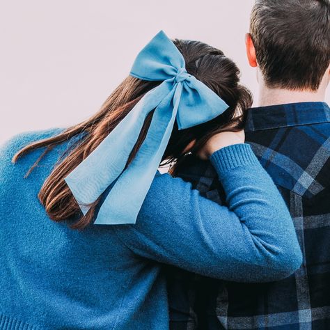 I handmade this blue bow and wore it for my engagement photos! I personally enjoy the large size for special events and I'm currently working on making smaller sizes as well. These are handmade with Dusty Blue Chiffon fabric. I used something that is unconventional in the United States. I use something called a Pony Hook. It is a piece of metal that hooks onto my hair elastic after doing my half up do! Let me know if you have any questions and please check out my Etsy store 💙 (Lazuki Creatio... Half Up Do, Hair Elastic, A Pony, Half Updo, Hair Elastics, Blue Bow, Half Up, Chiffon Fabric, Dusty Blue