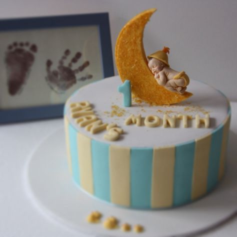 A Full Moon one month Birthday cake by Bake Me Bella 1month Birthday Cake, Monthly Cakes For Baby Boy, Baby One Month Cake, 1st Month Birthday Cake, One Month Cake Baby Boy, 1 Month Cake Ideas, 1month Birthday Ideas, One Month Birthday Cake, 1st Month Birthday Ideas