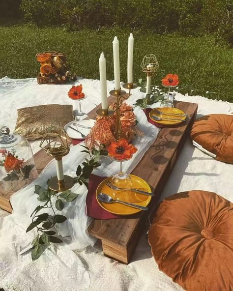 For an outdoor gathering that's for just a few, bust out the picnic blankets. But this isn't the picnic of your childhood—use candles, elegant server ware, and plush cushions for an upscale vibe. We love this earthy, boho picnic aesthetic but you can match your picnic decor to your vibe! #PicnicAesthetic #BohoPicnic #PicnicAestheticIdeas #MyDomaine Fall Picnic, Picnic Decorations, Party Setup, Garden Picnic, Outdoor Birthday, Boho Picnic, Outdoor Party Decorations, Picnic Party, Outdoor Parties