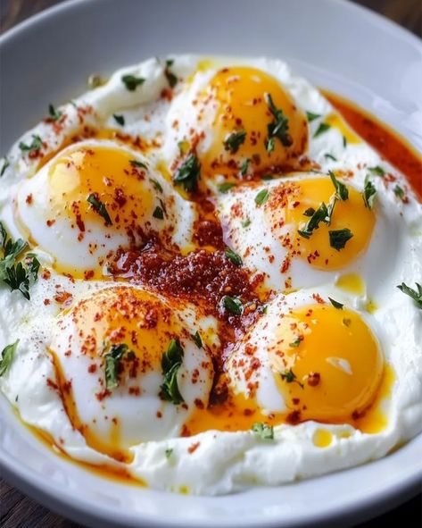 Learn how to make Turkish Eggs (Cilbir) with this simple recipe. A flavorful brunch idea featuring yogurt, poached eggs, and spiced butter. Turkish Yogurt, Poached Egg Recipe, Turkish Eggs, Spiced Butter, Flavored Salts, Healthy Breakfasts, Brunch Dishes, Poached Egg, Cucumber Tomato