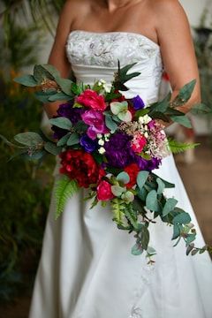 Jewel Tone Rainbow Peony Wedding Bouquets Custom Purple Red - Etsy Bright Cascade Wedding Bouquet, Jewel Tone Wedding Decor Table Settings, Jewel Tone Wedding Flowers Bouquets, Jewel Tone Flowers Wedding, Jewel Tone Wedding Centerpieces, Fuschia Wedding Flowers, Fall Jewel Tone Wedding, Jewel Tone Wedding Bouquet, Gem Tone Wedding