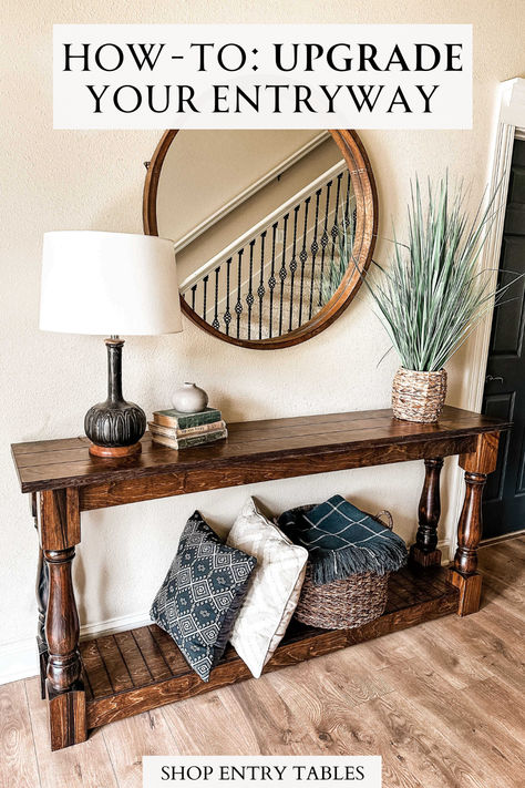 The entryway is the most important room in a house. It's the first thing you and your guests see when entering. Elevate your space with our entryway tables! Available in varying colors and sizes, we offer a variety that ensures everyone can find the perfect fit for their home. Shop our selection of entry tables to refresh your foyer! Entryway Table With Baskets Underneath, Western Entry Table Decor, Front Entry Table Decor, Tv Stand And End Tables, Farmhouse Coffee Tables, Diy Entry Table, Stacking Books, Rustic Entryway Table, Wall Stove