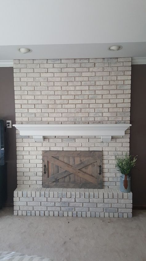 Wood Door Fireplace, Fireplace Cabinet Doors, Fireplace Doors Ideas Diy Projects, Old House Fireplace Makeover, Diy Fireplace Draft Blocker, Diy Fireplace Doors, Barn Doors For Fireplace, Fireplace Barn Doors Ideas, Barn Door Fireplace Cover