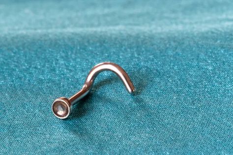 Infected Nose Ring, Getting Nose Pierced, Corkscrew Nose Ring, Cute Nose Studs, Nose Piercing Bump, Piercing Bump, Hooked Nose, Nose Piercing Ring, Cute Nose Piercings