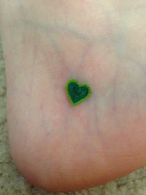 Green heart tattoo.. I must get before my next birthday Realistic Sacred Heart Tattoo Design, Green Heart Tattoo, Skull Couple Tattoo, Love Heart Tattoo, Couple Tattoos Love, Red Heart Tattoos, Sacred Heart Tattoos, Small Heart Tattoos, Green Love